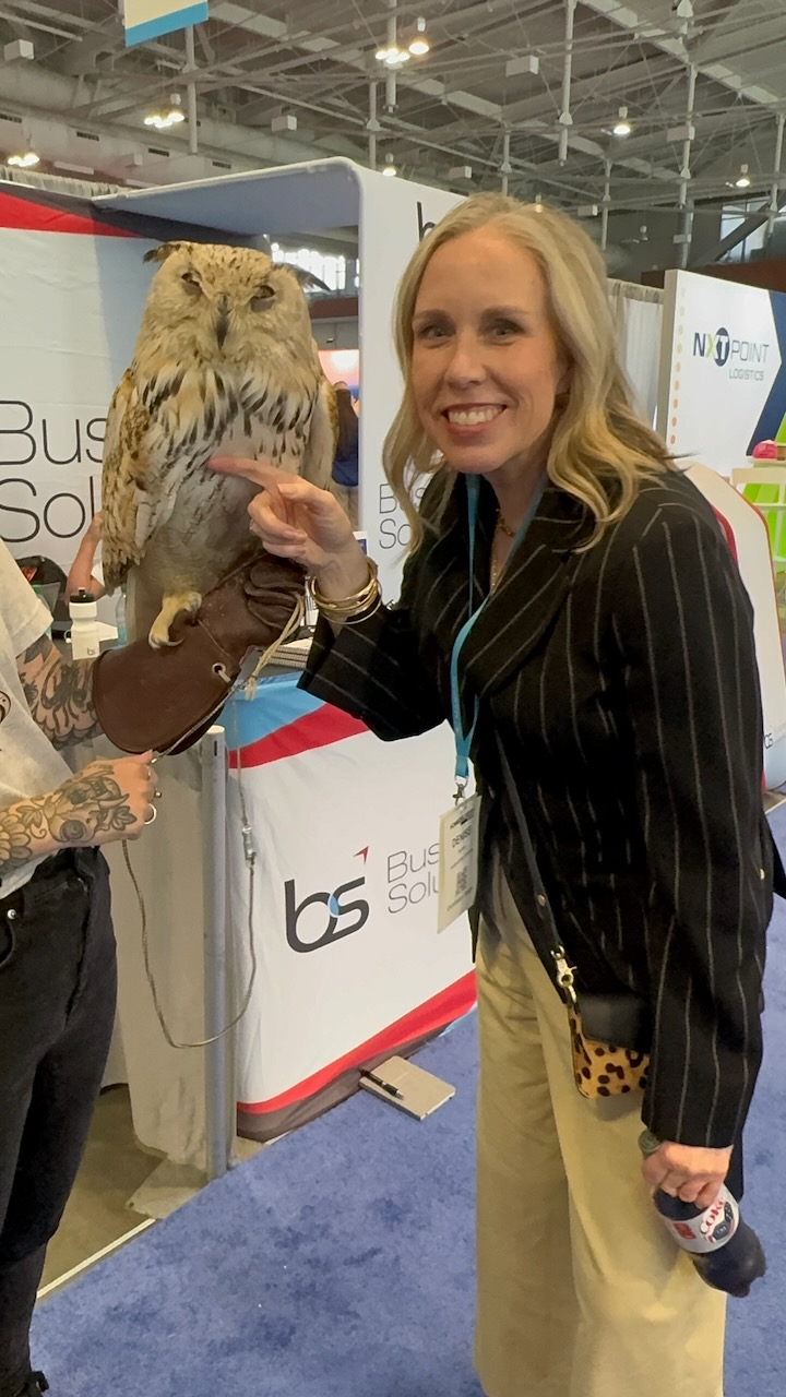 Meeting a friendly owl on the Home Delivery World show floor.