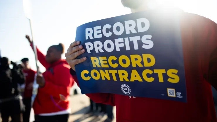United Auto Workers members on a picket line outside the Ford Michigan Assembly plant