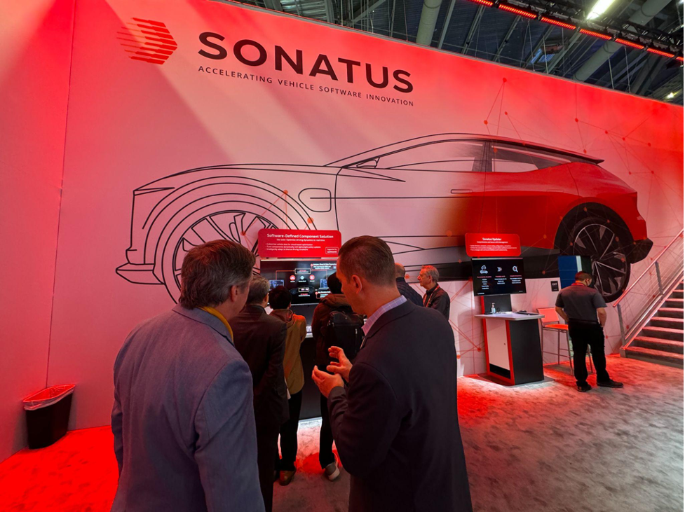 Dr. John Heinlein, Ph.D. giving George Ayres a tour of the Sonatus booth in West Hall at CES. Photo by Mariestella