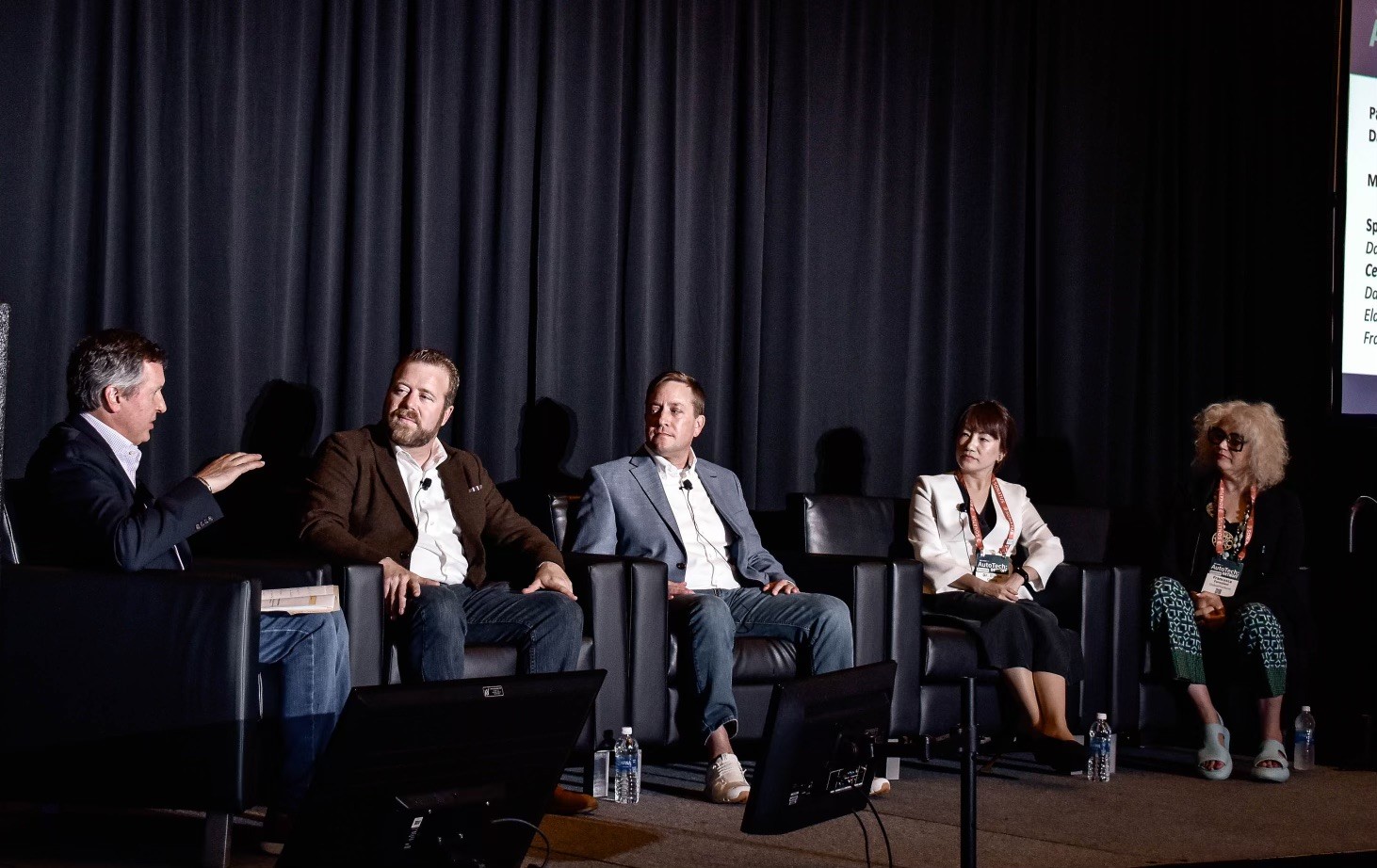 George Ayres moderating a panel on the future of in-vehicle infotainment