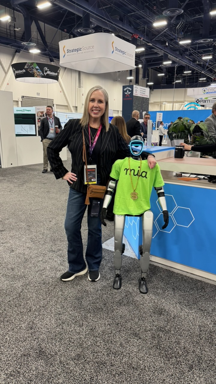 Saying hi to Mia, the humanoid robot, at NADA Show.