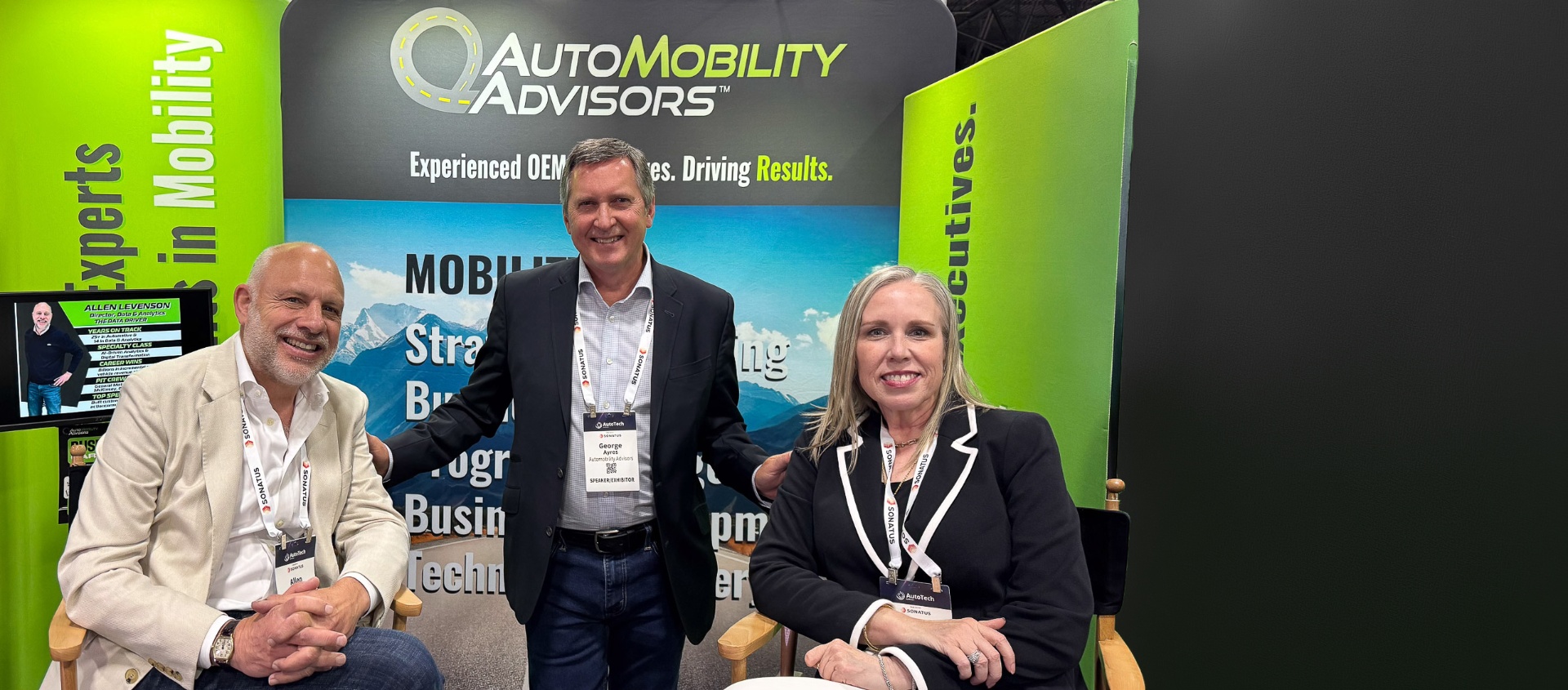 Allen Levenson, George Ayres, and Denise Barfuss of AutoMobility Advisors at the AMA booth.