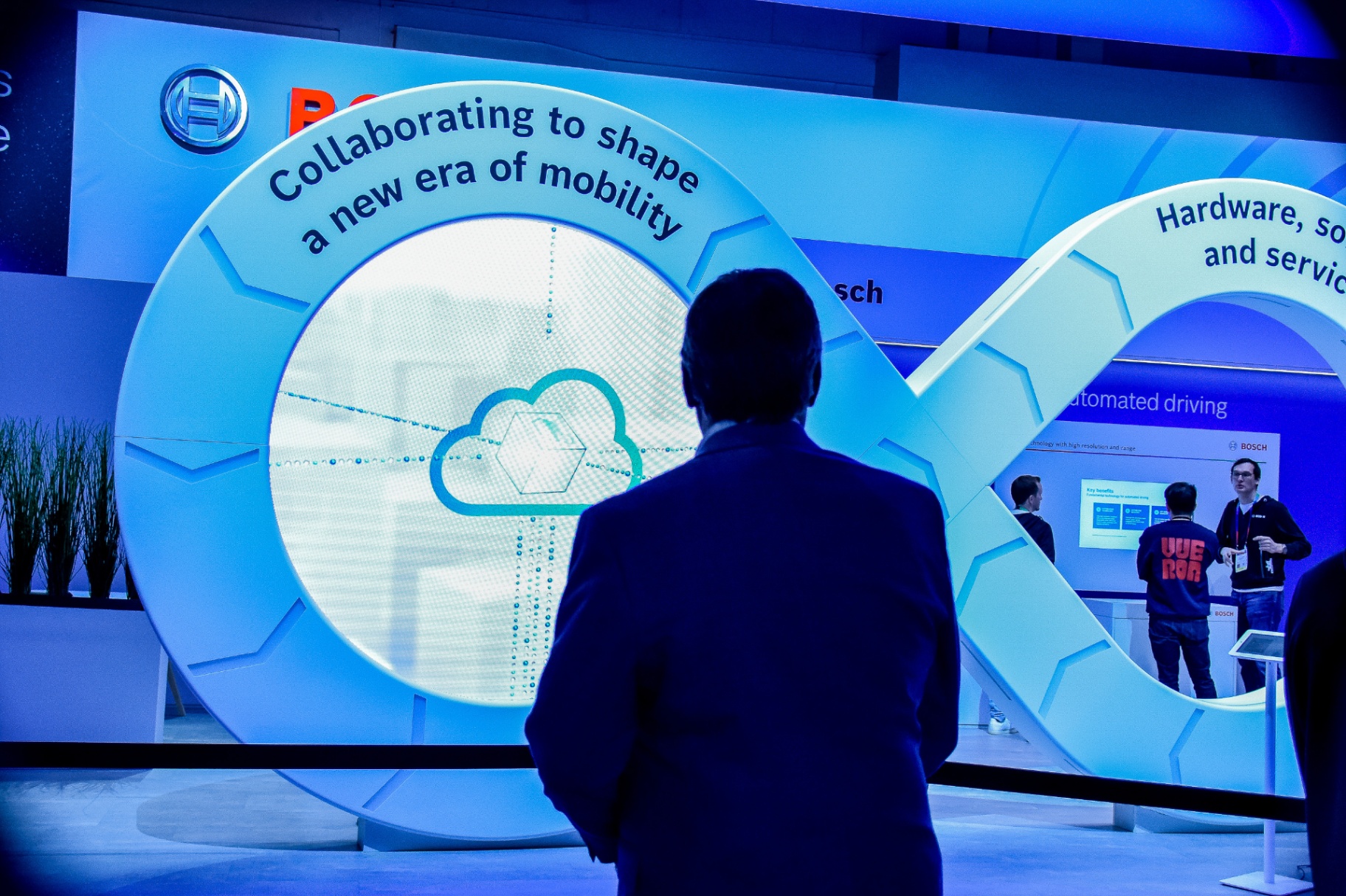 Attendee viewing Bosch 'Collaborating to shape a new era of mobility' installation at CES 2023