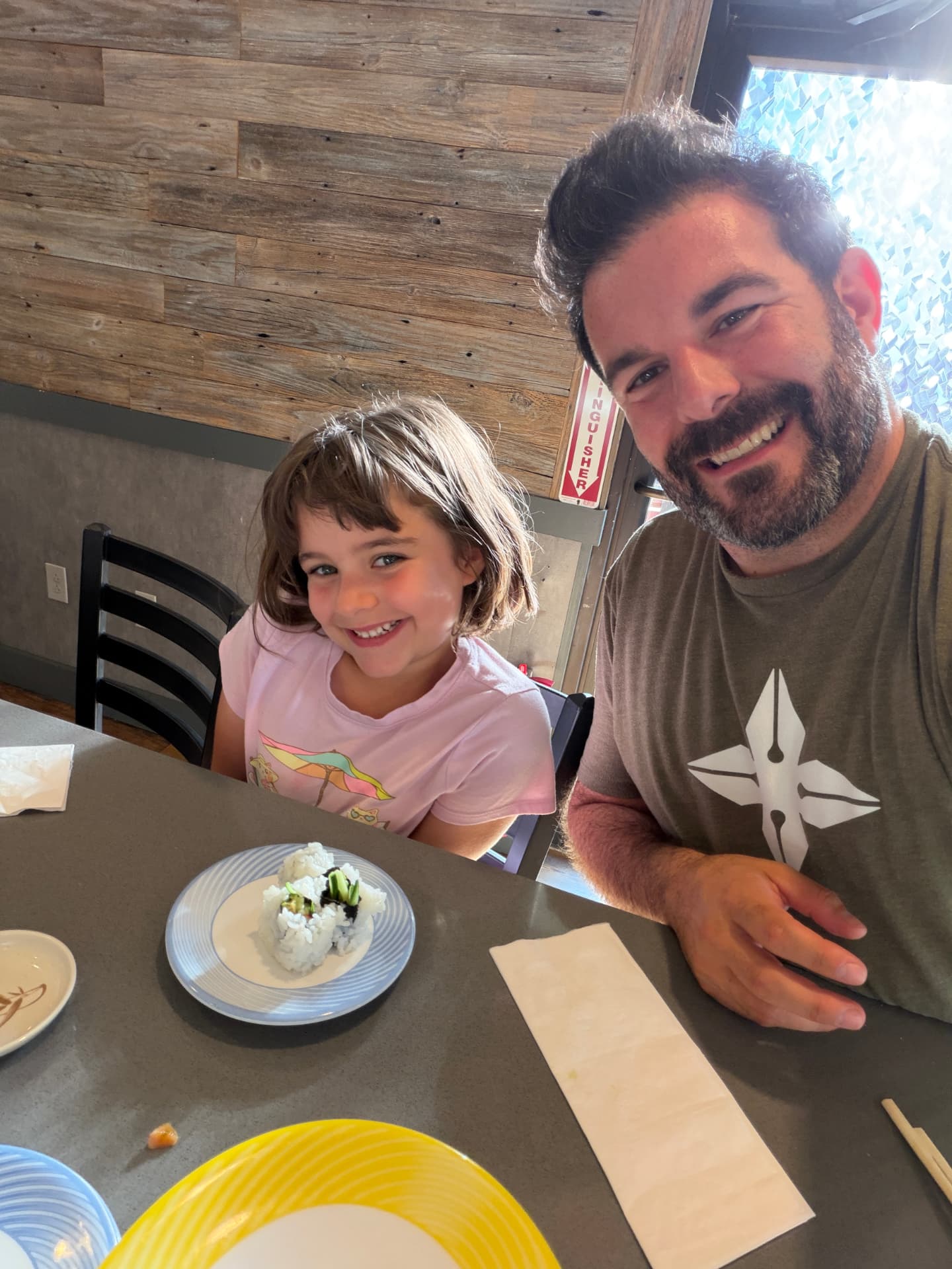 Chip at sushi with his daughter.